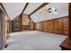 Bright living room with vaulted ceilings, wood beams, fireplace and ample natural light at 4116 River Cliff Chase Se, Marietta, GA 30067