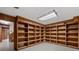 Recreation room with wood paneling, built-in bookshelves, and tiled flooring at 4116 River Cliff Chase Se, Marietta, GA 30067