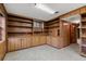 Room with wood paneling, built-in bookcases and a wet bar at 4116 River Cliff Chase Se, Marietta, GA 30067