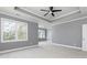 Main bedroom with ceiling fan and ample natural light at 1292 Creekside Se Ter, Smyrna, GA 30082