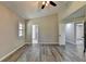 Bright bedroom with vaulted ceiling, wood-look floors and bathroom access at 1428 Brandon Sq, Lawrenceville, GA 30044