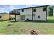 Rear view of a two story house with deck at 1428 Brandon Sq, Lawrenceville, GA 30044