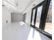 Spacious basement with polished floors and large sliding glass doors offering plenty of natural light at 4238 Paces Ferry Se Rd, Atlanta, GA 30339