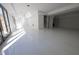 Spacious basement featuring sleek, polished floors and abundant natural light from large sliding glass doors at 4238 Paces Ferry Se Rd, Atlanta, GA 30339