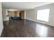 Open-concept living area with hardwood floors and ample natural light ready to make your own at 4238 Paces Ferry Se Rd, Atlanta, GA 30339