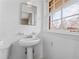 Small bathroom with white sink and vanity at 4334 Greenleaf Sw Cir, Atlanta, GA 30331