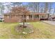 Brick ranch house with covered carport and landscaping at 4334 Greenleaf Sw Cir, Atlanta, GA 30331