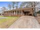 Brick ranch house with carport and yard at 4334 Greenleaf Sw Cir, Atlanta, GA 30331