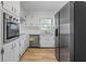 Kitchen with stainless steel appliances and white cabinets at 4334 Greenleaf Sw Cir, Atlanta, GA 30331