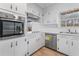 Kitchen with stainless steel appliances and white cabinets at 4334 Greenleaf Sw Cir, Atlanta, GA 30331