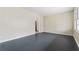Empty living room with dark hardwood floors at 4334 Greenleaf Sw Cir, Atlanta, GA 30331