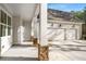 This elegant new construction features a large two-car garage and substantial stone support columns at 101 Forsyth Park Ln, Woodstock, GA 30188