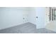 Walk-in closet with white wire shelves and carpet flooring at 1020 Cottonwood Ln, Loganville, GA 30052