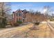 Brick home with a large backyard and mature trees at 1172 Lake Washington Dr, Lawrenceville, GA 30043