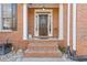 Elegant front door with a wreath and sidelights at 1172 Lake Washington Dr, Lawrenceville, GA 30043