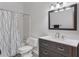 Clean bathroom with shower/tub combo, vanity, and updated flooring at 1206 Gettysburg Pl, Atlanta, GA 30350