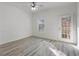 Bedroom with hardwood floors and access to balcony at 1206 Gettysburg Pl, Atlanta, GA 30350