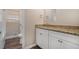 Clean bathroom with granite countertop and white vanity at 3144 Granada, Atlanta, GA 30344