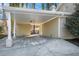 Covered carport with concrete parking area at 3144 Granada, Atlanta, GA 30344