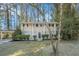 Two-story house with a covered carport and landscaping at 3144 Granada, Atlanta, GA 30344