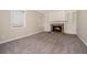 Cozy living room with fireplace and built-in shelving at 3144 Granada, Atlanta, GA 30344