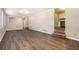 Open living room with hardwood floors and kitchen view at 3144 Granada, Atlanta, GA 30344