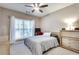 Bright bedroom with a queen-size bed and large window at 4333 Dunwoody Park # 2113, Dunwoody, GA 30338