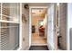Open door reveals a glimpse of the living area at 4333 Dunwoody Park # 2113, Dunwoody, GA 30338