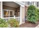 Condo entrance with small porch and white railing at 4333 Dunwoody Park # 2113, Dunwoody, GA 30338