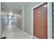 Building hallway with tile flooring and access to unit at 4333 Dunwoody Park # 2113, Dunwoody, GA 30338