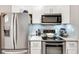 Modern kitchen with stainless steel appliances at 4333 Dunwoody Park # 2113, Dunwoody, GA 30338