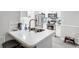 Modern kitchen with white cabinets and stainless steel appliances at 4333 Dunwoody Park # 2113, Dunwoody, GA 30338