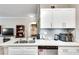 Kitchen with stainless steel appliances and white cabinets at 4333 Dunwoody Park # 2113, Dunwoody, GA 30338