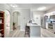 Open concept kitchen with island and breakfast bar at 4333 Dunwoody Park # 2113, Dunwoody, GA 30338