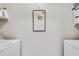 Bright laundry room with washer and dryer hookups at 4333 Dunwoody Park # 2113, Dunwoody, GA 30338