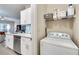 Laundry room with washer, dryer and storage at 4333 Dunwoody Park # 2113, Dunwoody, GA 30338