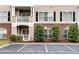 Condo building exterior with reserved parking spaces at 4333 Dunwoody Park # 2113, Dunwoody, GA 30338