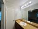 Clean bathroom featuring a vanity and mirror at 5117 Panola Valley Dr, Lithonia, GA 30038