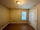 Bright bedroom with tile flooring and a window at 5117 Panola Valley Dr, Lithonia, GA 30038