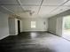 Spacious bedroom with wood-look floors and ceiling fan at 5117 Panola Valley Dr, Lithonia, GA 30038