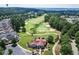 Aerial view of the golf course and surrounding homes in Heron Bay at 7256 Eton Ln, Locust Grove, GA 30248
