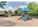 Community playground for children with colorful slides, climbing structures, and covered play areas at 7256 Eton Ln, Locust Grove, GA 30248