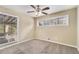 Spacious bedroom featuring a ceiling fan and ample natural light at 2280 Connally Ct, Atlanta, GA 30344
