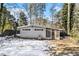 Gray house exterior with screened porch and snowy yard at 2280 Connally Ct, Atlanta, GA 30344