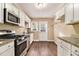 Kitchen with granite countertops and stainless steel appliances at 2280 Connally Ct, Atlanta, GA 30344