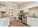 Updated kitchen with granite countertops and stainless steel appliances at 2280 Connally Ct, Atlanta, GA 30344