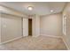 Spacious bedroom with neutral carpeting and ample closet space at 16 S Eugenia Nw Pl, Atlanta, GA 30318