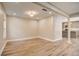 Open concept dining area with light walls and wood-look floors at 16 S Eugenia Nw Pl, Atlanta, GA 30318