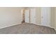 Spacious bedroom with neutral walls and carpet at 2456 Colorado Sw Trl, Atlanta, GA 30331