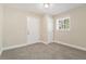 Simple bedroom with neutral walls and carpet flooring at 2456 Colorado Sw Trl, Atlanta, GA 30331